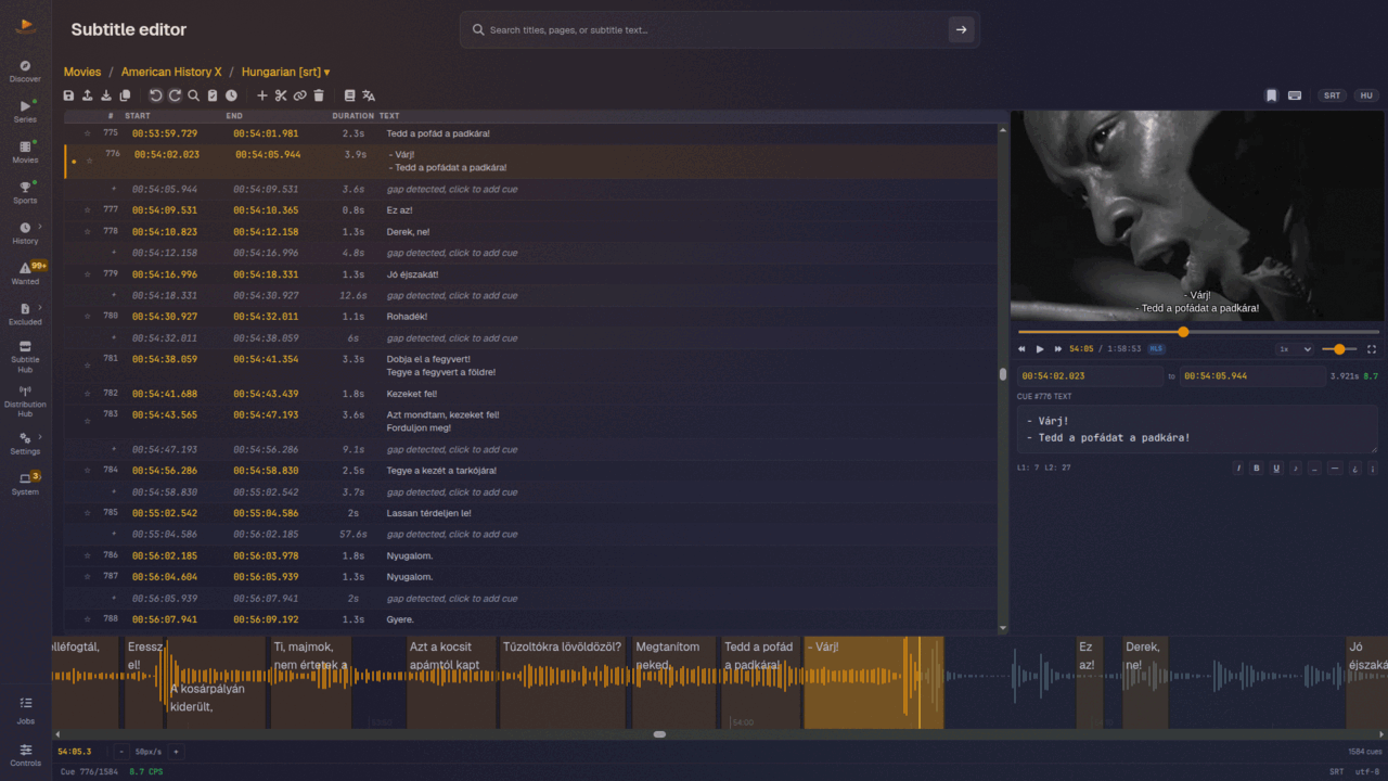 The Bazarr+ subtitle editor: the cue list at the left with start, end and duration columns and gaps called out between cues, the film playing at the top right with the current line burned over it, an editable text box for that cue beneath it, and a waveform across the bottom with each cue drawn as a block over it